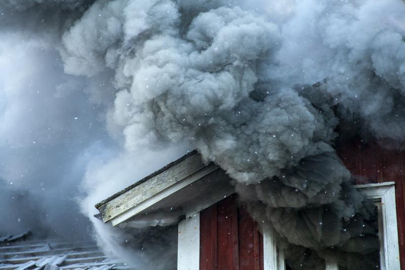 House that is covered in smoke